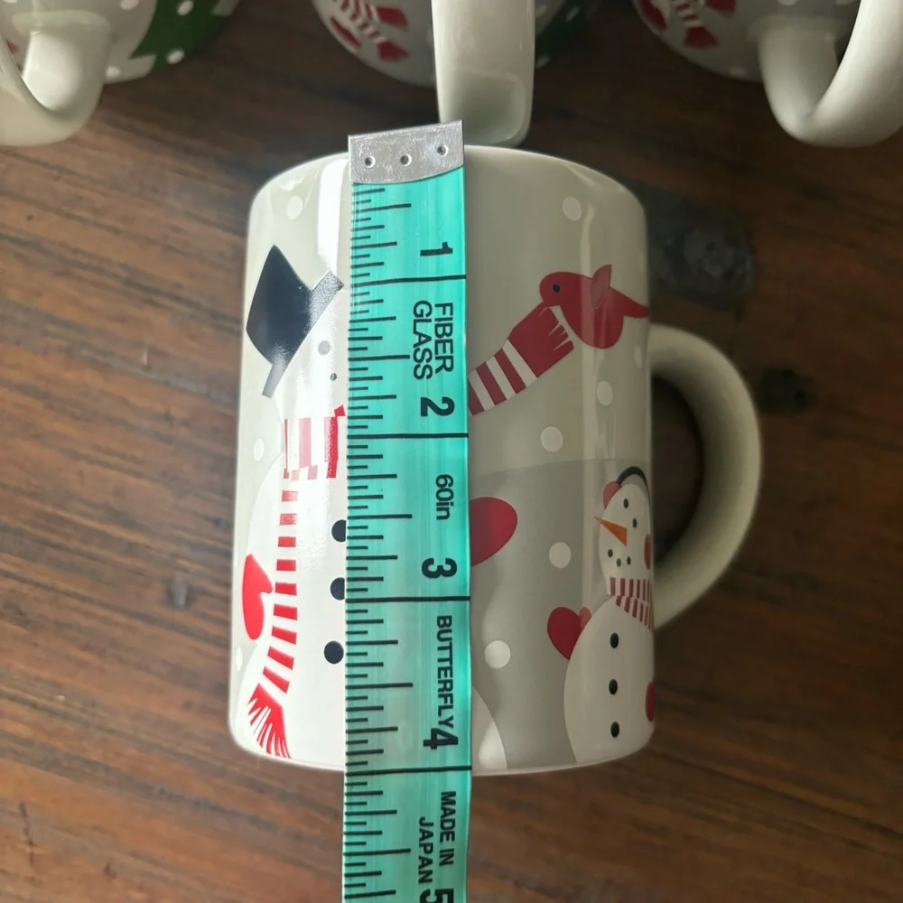 Crate & Barrel set of 4 Joan Anderson 2017 winter snowman ceramic mugs